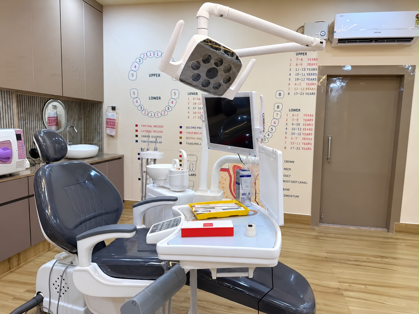 Advanced dental chair with intraoral camera monitor
